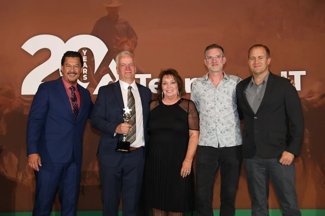 Kirk and Lisa Gramoll and John Halama Franchisee of the Year
